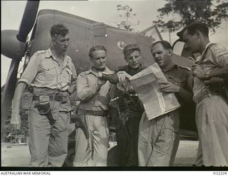 TOROKINA, BOUGAINVILLE ISLAND, SOLOMON ISLANDS. 1945-01-28. ARMY LIAISON OFFICER OF NO. 5 (BOOMERANG) SQUADRON RAAF ON PIVA AIRFIELD, CAPTAIN (CAPT) R. DE GROOTE, SYDNEY, NSW (WITH MAP), GIVES LAST ..