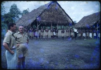 Bishop David Hand and District Commissioner Sid Elliot-Smith with the assembled staff of the hospital at Saiho, Papua New Guinea, 1951 / Albert Speer