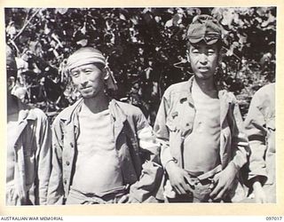 TYPES OF JAPANESE SOLDIERS AMONG THE SICK AND WOUNDED WHO ARE AWAITING EVACUATION FROM NUMA NUMA TO TOROKINA. MEMBERS OF THE AUSTRALIAN SURRENDER PARTY FROM HEADQUARTERS 2 CORPS HAVE ARRIVED AT ..