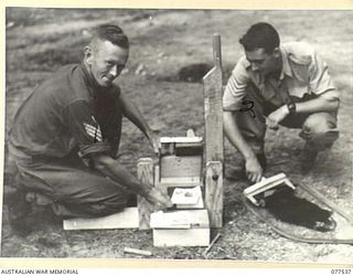 TOROKINA AREA, BOUGAINVILLE ISLAND. 1944-12-12. QX28022 STAFF SERGEANT G. WILEY (1) AND VX130447 SERGEANT J.R. FERGUSON (2) INTELLIGENCE TOPOGRAPHICAL BRANCH, HEADQUARTERS, 2ND AUSTRALIAN CORPS, ..