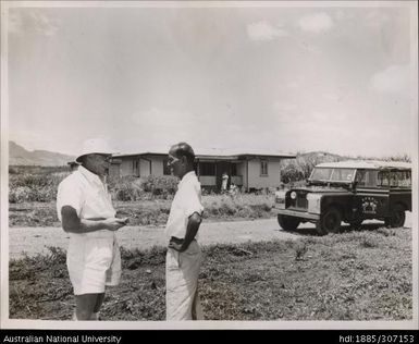 Field Officer speaking with Farmer