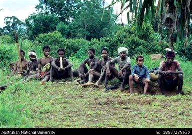 Relaxing by an old longhouse site in Febi territory