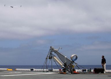 An unmanned aerial vehicle (UAV) called the"Scan Eagle"launches from a pneumatic wedge catapult launcher on the flight deck of the U.S. Navy Tarawa Class Amphibious Assault Ship USS SAIPAN (LHA 2) during operations in the Atlantic Ocean on Aug. 23, 2006. The"Scan Eagle"is designed to provide persistent intelligence, surveillance and reconnaissance data, battle damage assessment and communications relay in support of the Global War on Terrorism. (U.S. Navy photo by Mass Communication SPECIALIST SEAMAN Patrick W. Mullen III) (Released)