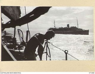 LANGEMAK BAY, NEW GUINEA. 1944-05-21. THE AMERICAN HOSPITAL SHIP USS SOLACE VIEWED FROM HMAS KAPUNDA NEAR FINSCHHAFEN