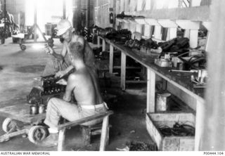 Late party of Japanese prisoners at a base. Japanese prisoners worked in the War Criminal Compound under RAN supervision repairing engines and other mechanical equipment. Work on an RAN base ..