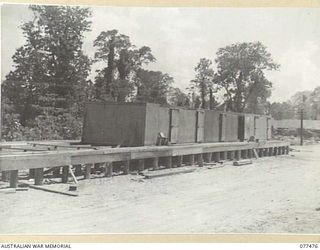 TOROKINA, BOUGAINVILLE ISLAND. 1944-12-04. THREE 1500 CUBIC FEET REFRIGERATION CHAMBERS UNDER CONSTRUCTION AT HEADQUARTERS, 2ND BASE SUPPLY DEPOT