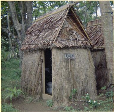 Grass hut toilet for women, Nasalai, Fiji, 1966, 2 / Michael Terry