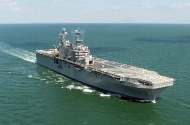 Starboard bow view of the US Navy (USN) TARAWA CLASS: Amphibious Assault Ship USS SAIPAN (LHA 2) underway off the coast of Virginia Beach, Virginia (VA)