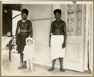 [Joan Stanley and two unidentified local men, Papua New Guinea]