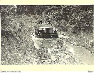 AMBOGA RIVER, NEW GUINEA. 1944-04-17. VX139729 SERGEANT M. WRIGHT, 72ND DEPUTY COMMANDER ROYAL ENGINEERS (A.I.F.), (1), WITH VX104793 SAPPER H. OXNAM, 10TH FIELD COMPANY, ROYAL AUSTRALIAN ENGINEERS ..