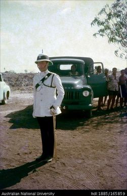 Man in white military uniform