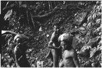 Tuguma carriers, some with barkcloth caps