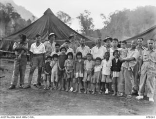 TOROKINA, BOUGAINVILLE ISLAND, 1945-01-05. NX102393 LIEUTENANT D. KINNA, MILITARY HISTORY SECTION AND SERGEANT H. HONG CHOY, LANGUAGE DETACHMENT LAND HEADQUARTERS, HEADQUARTERS, 2ND AUSTRALIAN ..