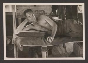 [Henry J. Cates, Jr., on Cot]