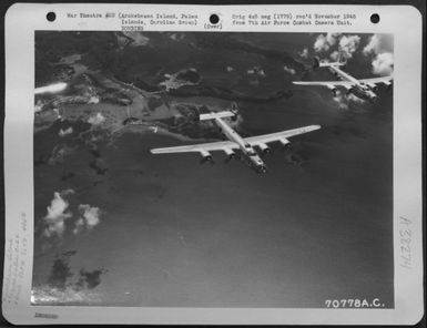 On 25 November 1944 Consolidates B-24 Liberators Of The 856Th And 867Th Bomb Squadrons, 484Th Bomb Group Participated In A Raid On Arakebesan Island, Palau Islands, Caroline Group. Here B-24'S Leave The Smoking Target. (U.S. Air Force Number 70778AC)