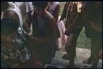 Local people at an archaeology exhibit, Moorea