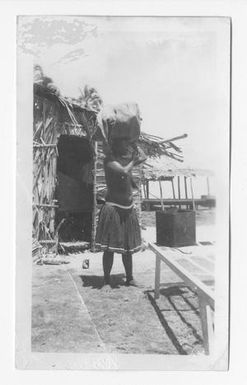 [Bougainvillean Woman Carrying Bundle On Head, #2]