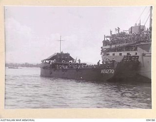 BOIKEN, NEW GUINEA. 1945-07-15. TROOPS OF 2/6 CAVALRY (COMMANDO) REGIMENT, GOING ABOARD THE MV MANOORA AT CAPE WOM. THE VESSEL IS TAKING THEM BACK TO THE MAINLAND ON LEAVE