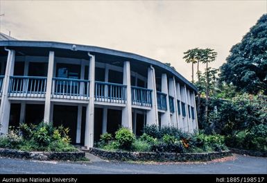 Fiji - white building, blue balcony railings and blue trim on roof