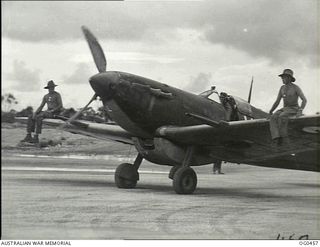 KIRIWINA, TROBRIAND ISLANDS, PAPUA. 1944-01-11. THE WEATHER IS HOT WHERE THE SPITFIRE AIRCRAFT OF NO. 79 (SPITFIRE) SQUADRON RAAF ARE OPERATING IN THE NEW GUINEA AREA AND GROUND CREWS SAVE ENERGY ..