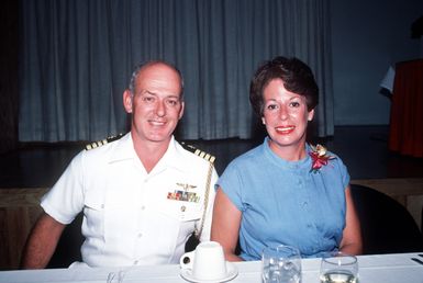 Captain Paul O'Connor, chief of staff for Commander Naval Base Pearl Harbor, and his wife attend a Military Spouse Day luncheon at the officers club