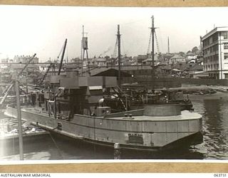 SYDNEY, NSW. 1944-01-22. A GENERAL VIEW OF THE MV "FRANCES PEAT" WHICH IS IN THE PROCESS OF BEING ARMED BEFORE BEING PUT INTO SERVICE WITH THE AUSTRALIAN SMALL SHIPS SECTION IN NEW GUINEA WATERS