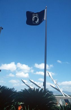 Missing Man Formation, MIA Memorial at Hickam Air Force Base, Hawaii Air National Guard. With MIA/POW flag flying