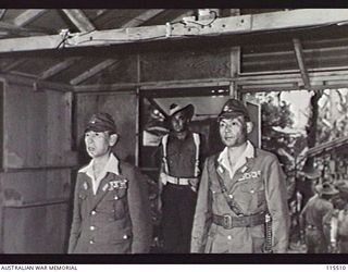 TOROKINA, BOUGAINVILLE. 1945-09-08. LIEUTENANT-GENERAL (LT-GEN) S. G. SAVIGE, GENERAL OFFICER COMMANDING 2 CORPS, ACCEPTED THE SURRENDER OF ALL JAPANESE FORCES ON BOUGAINVILLE FROM LT-GEN M. KANDA, ..