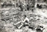 Ralph Gaugler shaving on Guadalcanal, 1940s