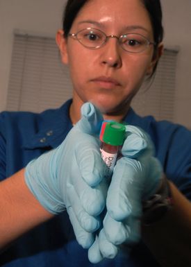 U.S. Navy PETTY Officer 2nd Class Diana Rodriguez, a Medical Laboratory Technician, works a specimen analysis at the U.S. Naval Hospital Guam, Branch Medical Clinic laboratory located on Naval Base Guam. Rodriguez performs routine tests in the laboratory to provide data for use in diagnosis and treatment of patients. (U.S. Navy PHOTO by Mass Communication SPECIALIST 2nd Class John F. Looney) (Released)