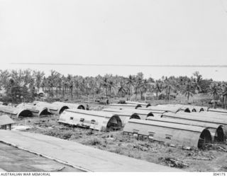 MANUS ISLAND, ADMIRALTY ISLANDS. POSTWAR VIEW OF DERELICT QUONSET HUTS. (NAVAL HISTORICAL COLLECTION)
