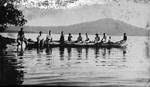 People in a long canoe, New Guinea?, c1924 to ?