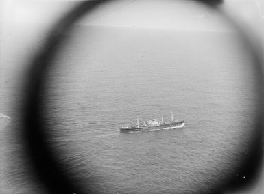 [Aerial view of a ship on the water]