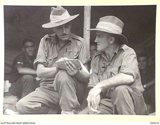 CAPE WOM, WEWAK, NEW GUINEA, 1945-07-29. WARRANT OFFICER 1 H. GYE, AN ORIGINAL MEMBER OF THE 2/2 INFANTRY BATTALION, WHO SAW SERVICE IN THE MIDDLE EAST, GREECE, CRETE AND NEW GUINEA (1), WITH ..