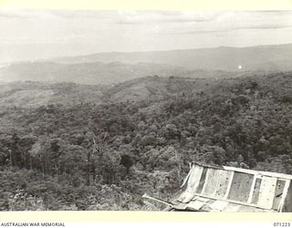 FINSCHHAFEN AREA, NEW GUINEA, 1944-03-17. JIVEVENANG, THE PIMPLE, COCONUT RIDGE, STEEPLE TREE AND FOUGASSE CORNER VIEWED FROM SATTELBERG AT 1400 HOURS