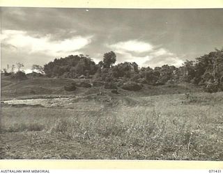 FINSCHHAFEN AREA, NEW GUINEA. 1944-03-21. A SECTION OF A PANORAMA VIEWING NORTH HILL FROM WITHIN THE AREA OF HEADQUARTERS, 2ND AUSTRALIAN CORPS. (JOINS WITH 71430)