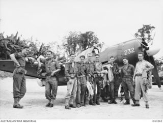 TOROKINA, BOUGAINVILLE ISLAND, SOLOMON ISLANDS. 1945-08-16. MEMBERS OF NO. 5 (TACTICAL RECONNAISSANCE) SQUADRON RAAF WHO DROPPED LEAFLETS GIVING INSTRUCTIONS TO JAPANESE FORCES TELLING THEM HOW AND ..