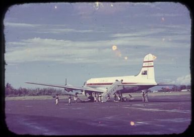 Qantas DC4 on the tarmac at Lae, between 1955 and 1960 / Tom Meigan