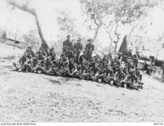 Guard of the 10th Australian Infantry Battalion, Champions of the 18th Australian Infantry Brigade. Left to right, back row (standing): SX12030 Lieutenant E C S Meldrum; SX1323 Warrant Officer ..