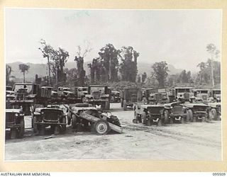 TOROKINA, BOUGAINVILLE, 1945-08-23. WRECKED MOTOR TRUCKS IN THE SUB DISPOSAL AREA, 8 VEHICLE PARK AUSTRALIAN ARMY ORDNANCE CORPS. (JOINS WITH 95510)