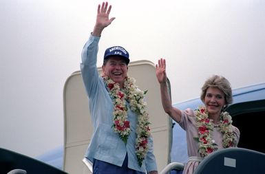 President Ronald Reagan and Nancy Reagan Waving During Their Departure Via Air Force One for Indonesia at Anderson Air Force Base in Guam