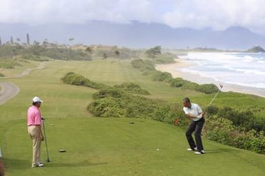 Barack Obama plays golf with Prime Minister Najib Razak, Joe Paulsen, and Mike Brush in Kaneohe Bay, Hawaii, December 24, 2014