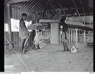 SEGI AREA, NEW GEORGIA, BRITISH SOLOMON ISLANDS PROTECTORATE. INTERIOR VIEW OF THE CHURCH SHOWING DAMAGE AFTER A STRIKE BY US AIRCRAFT. (NAVAL HISTORICAL COLLECTION)