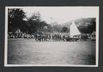 Constables pulling a boat in a parade, Papua New Guinea, c1945 to 1952?