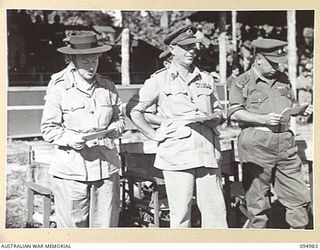 TOROKINA, BOUGAINVILLE. 1945-08-16. A SCENE DURING THE SINGING OF A HYMN AT THE VICTORY THANKSGIVING SERVICE HELD AT GLOUCESTER OVAL FOR TROOPS OF THE AUSTRALIAN MILITARY FORCES. IDENTIFIED ..