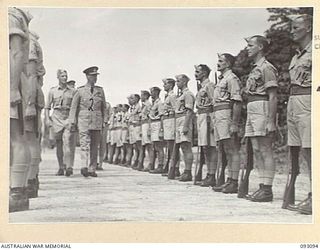 TOROKINA, BOUGAINVILLE, 1945-06-13. THE GOVERNOR GENERAL OF NEW ZEALAND, MARSHAL OF THE ROYAL AIR FORCE, SIR CYRIL L.N. NEWALL (2), ON ARRIVAL AT PIVA AIRSTRIP, INSPECTING A GUARD OF HONOUR DRAWN ..