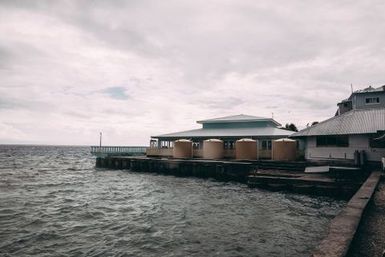 Four water tanks on wharf, Nukunonu, Tokelau