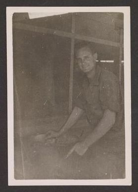 [Henry J. Cates Jr. with Washing Machine]