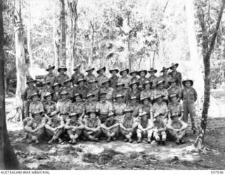 DOBODURA, NEW GUINEA. 1943-10-11. GROUP PORTRAIT OF AUSTRALIAN ARMY SERVICE CORPS, HEADQUARTERS, 11TH AUSTRALIAN DIVISION. LEFT TO RIGHT:- FRONT ROW:- QX16869 PRIVATE J WATKINS; NX153302 CORPORAL R ..