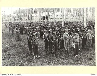 MADANG, NEW GUINEA. 1944-07-01. A JOIN-UP PHOTOGRAPH OF A MORNING PARADE OF THE 24TH INFANTRY BATTALION. TO JOIN TO PHOTOGRAPHS NO. 74435 AND 74436. IDENTIFIED PERSONNEL ARE:- VX115548 STAFF ..